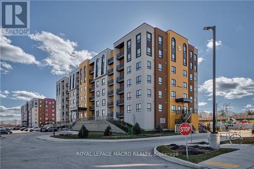 201 - 8 Culinary Lane, Barrie, ON - Outdoor With Facade