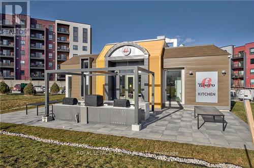 201 - 8 Culinary Lane, Barrie, ON - Outdoor With Facade