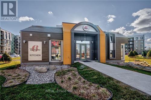 201 - 8 Culinary Lane, Barrie, ON - Outdoor With Facade