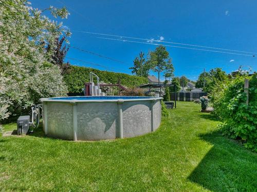 Backyard - 11395 Rue Maisonneuve, Mirabel, QC - Outdoor With Above Ground Pool With Backyard