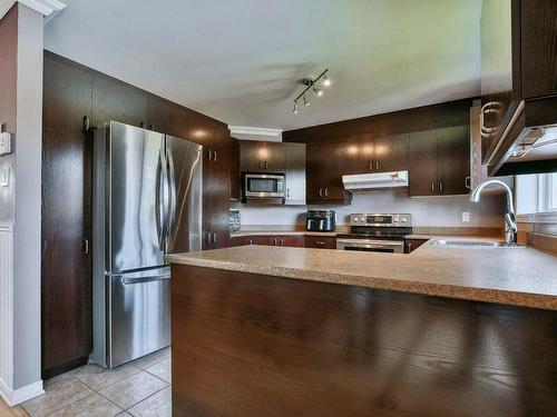 Cuisine - 11395 Rue Maisonneuve, Mirabel, QC - Indoor Photo Showing Kitchen With Double Sink