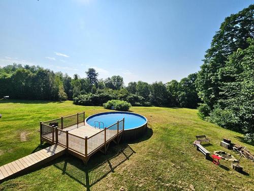 Backyard - 101 Ch. Welden, Grenville-Sur-La-Rouge, QC - Outdoor With Above Ground Pool With Backyard