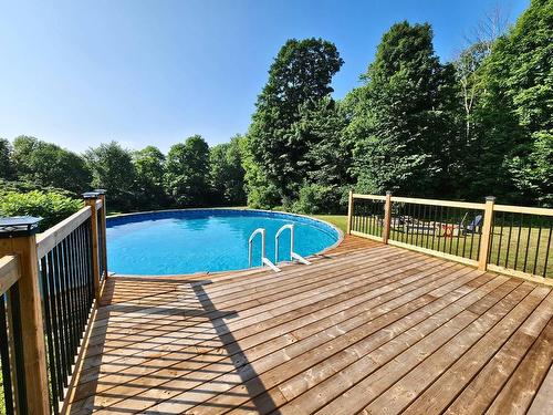 Pool - 101 Ch. Welden, Grenville-Sur-La-Rouge, QC - Outdoor With Above Ground Pool With Deck Patio Veranda