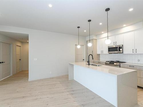 201-947 Whirlaway Cres, Langford, BC - Indoor Photo Showing Kitchen With Upgraded Kitchen