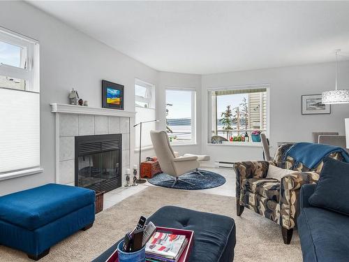 302A-650 Island Hwy South, Campbell River, BC - Indoor Photo Showing Living Room With Fireplace