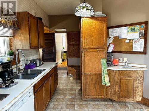 1411 105Th Street, North Battleford, SK - Indoor Photo Showing Kitchen With Double Sink