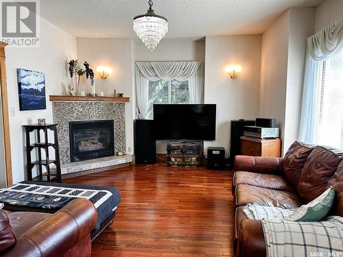 1411 105Th Street, North Battleford, SK - Indoor Photo Showing Living Room With Fireplace