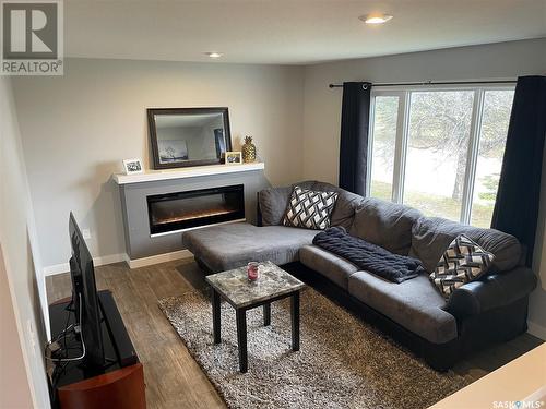 820 99Th Avenue, Tisdale, SK - Indoor Photo Showing Living Room With Fireplace