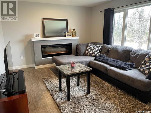 820 99Th Avenue, Tisdale, SK - Indoor Photo Showing Living Room With Fireplace