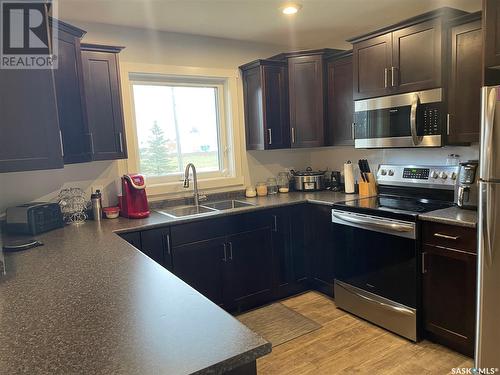 820 99Th Avenue, Tisdale, SK - Indoor Photo Showing Kitchen With Double Sink