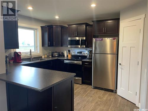 820 99Th Avenue, Tisdale, SK - Indoor Photo Showing Kitchen With Double Sink