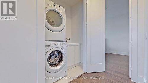 723 - 55 Merchants' Wharf Street, Toronto (Waterfront Communities), ON - Indoor Photo Showing Laundry Room