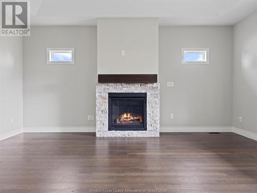 1904 Villa Canal, Ruthven, ON - Indoor Photo Showing Living Room With Fireplace