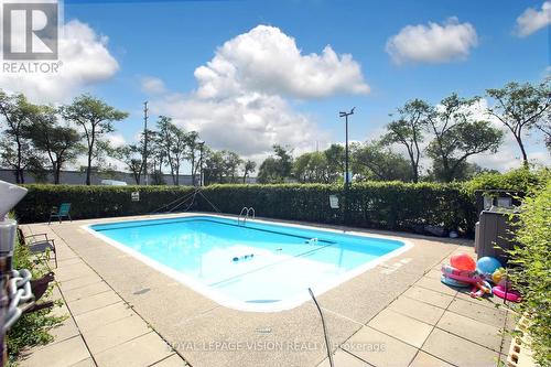 202 - 3065 Queen Frederica Drive, Mississauga (Applewood), ON - Outdoor With In Ground Pool With Backyard