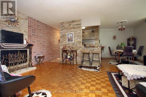 202 - 3065 Queen Frederica Drive, Mississauga (Applewood), ON - Indoor With Fireplace