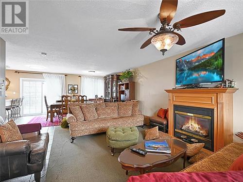 16 Regency Place, Brockville, ON - Indoor Photo Showing Living Room With Fireplace