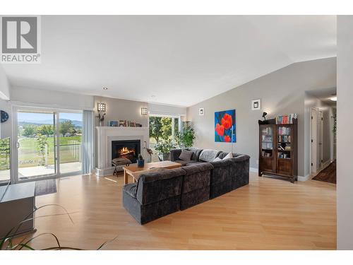 5550 Rittich Road, Kelowna, BC - Indoor Photo Showing Living Room With Fireplace