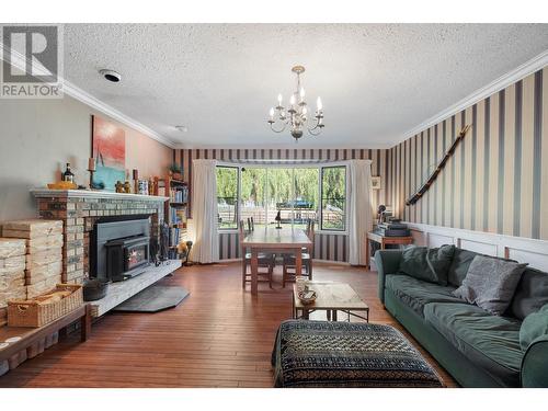 5550 Rittich Road, Kelowna, BC - Indoor Photo Showing Living Room With Fireplace