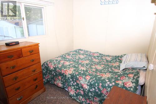 194 Mcguire Beach Road, Kawartha Lakes, ON - Indoor Photo Showing Bedroom