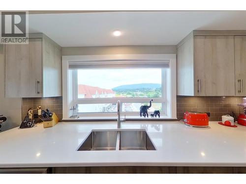 131 Harbourfront Drive Ne Unit# 503, Salmon Arm, BC - Indoor Photo Showing Kitchen With Double Sink