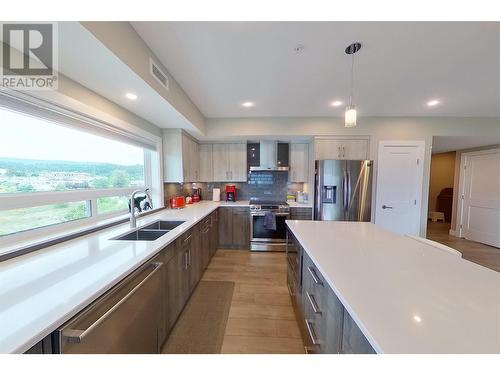 131 Harbourfront Drive Ne Unit# 503, Salmon Arm, BC - Indoor Photo Showing Kitchen With Double Sink