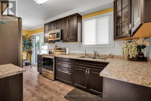 18 Cedarview Drive, Kawartha Lakes, ON - Indoor Photo Showing Kitchen With Double Sink