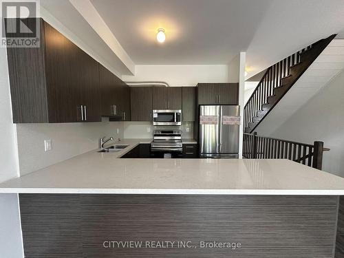 21 Turnberry Court, Bracebridge, ON - Indoor Photo Showing Kitchen With Double Sink