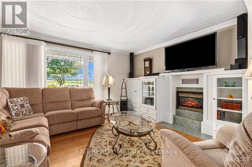 1430 Notre-Dame Street, Prescott And Russell, ON - Indoor Photo Showing Living Room With Fireplace