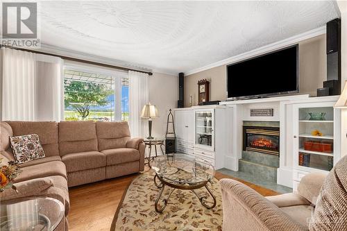 1430 Notre-Dame Street, Embrun, ON - Indoor Photo Showing Living Room With Fireplace