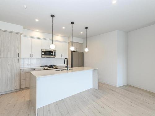 301-947 Whirlaway Cres, Langford, BC - Indoor Photo Showing Kitchen With Upgraded Kitchen