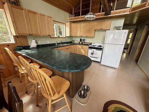 Lot 4 Wolf Island, Kenora, ON - Indoor Photo Showing Kitchen With Double Sink