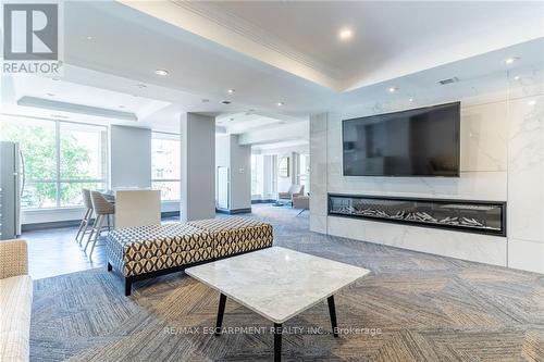 607 - 40 Old Mill Road, Oakville (Old Oakville), ON - Indoor Photo Showing Living Room With Fireplace