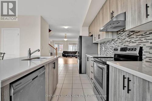 15 Bretlon Street, Brampton, ON - Indoor Photo Showing Kitchen With Stainless Steel Kitchen With Double Sink With Upgraded Kitchen