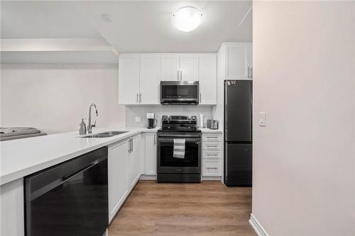 2750 King Street E|Unit #215, Hamilton, ON - Indoor Photo Showing Kitchen With Double Sink