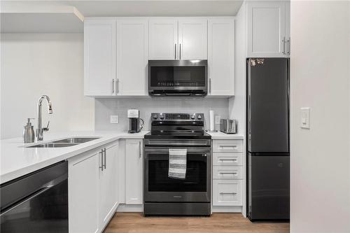 2750 King Street E|Unit #215, Hamilton, ON - Indoor Photo Showing Kitchen With Double Sink