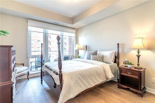 Large Primary Bedroom with Separate Balcony Door - 40 Old Mill Road|Unit #607, Oakville, ON - Indoor Photo Showing Bedroom