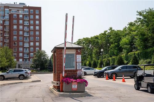 Security Gate - 40 Old Mill Road|Unit #607, Oakville, ON - Outdoor With Balcony With Facade