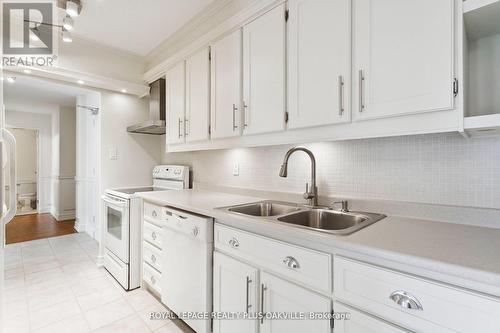 909 - 714 The West Mall W, Toronto (Eringate-Centennial-West Deane), ON - Indoor Photo Showing Kitchen With Double Sink