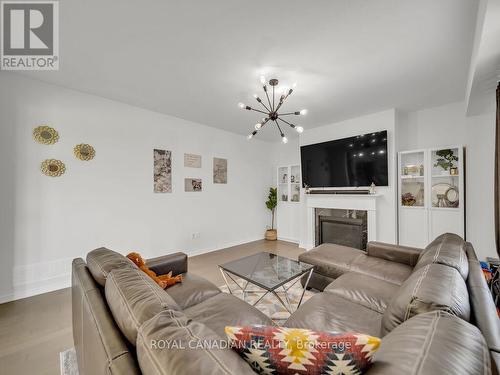 68 Mcwatters Street, Hamilton, ON - Indoor Photo Showing Living Room With Fireplace