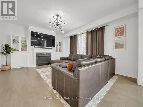 68 Mcwatters Street, Hamilton, ON - Indoor Photo Showing Living Room With Fireplace