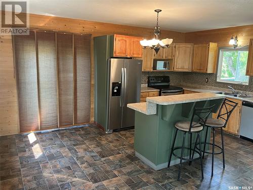 300 5Th Street N, Nipawin, SK - Indoor Photo Showing Kitchen With Stainless Steel Kitchen With Double Sink