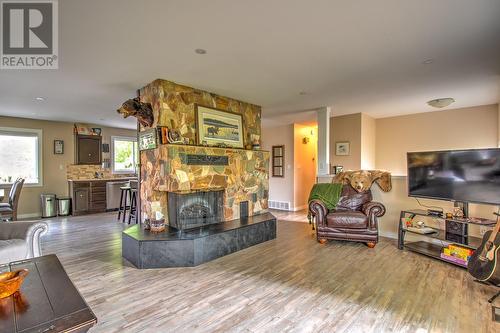 2611 6 Highway, Lumby, BC - Indoor Photo Showing Living Room With Fireplace