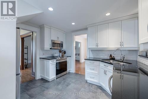 1009 Wellington Street, London, ON - Indoor Photo Showing Kitchen With Double Sink