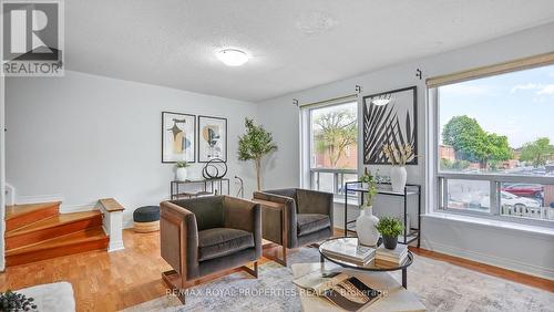 207 - 6442 Finch Avenue W, Toronto (Mount Olive-Silverstone-Jamestown), ON - Indoor Photo Showing Living Room