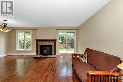 Living Room - 6085 Meadowhill Crescent, Ottawa, ON - Indoor Photo Showing Living Room With Fireplace