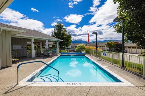 127-1405 Guisachan Place, Kelowna, BC - Outdoor With In Ground Pool With Deck Patio Veranda With Backyard