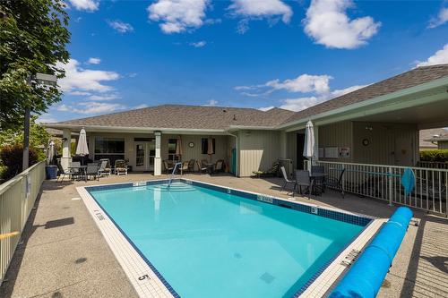 127-1405 Guisachan Place, Kelowna, BC - Outdoor With In Ground Pool With Deck Patio Veranda With Exterior