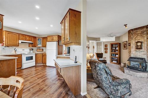 2652 Monford Road, Kelowna, BC - Indoor Photo Showing Kitchen With Fireplace