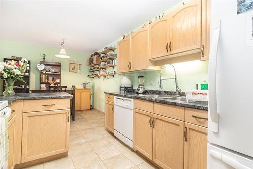 108-3163 Richter Street, Kelowna, BC - Indoor Photo Showing Kitchen With Double Sink