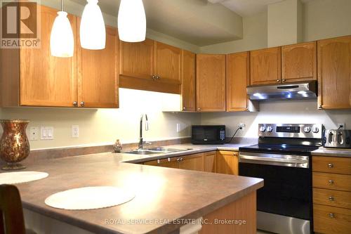 134 - 134 Hibernia Street, Cobourg, ON - Indoor Photo Showing Kitchen With Double Sink